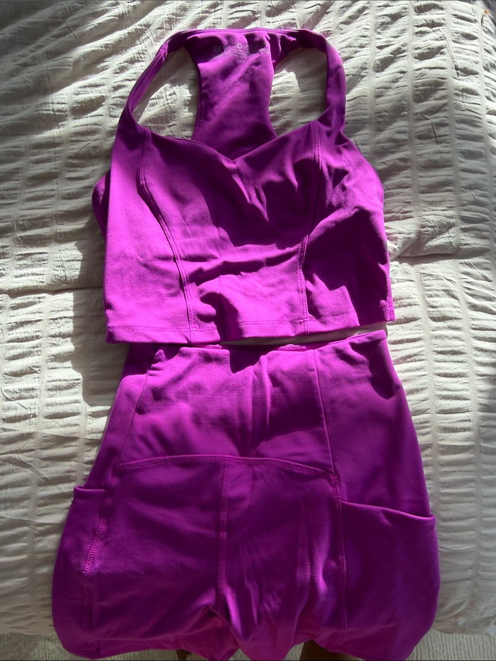 Beyond Yoga Purple Racerback Crop Top and High-Waist Shorts Set